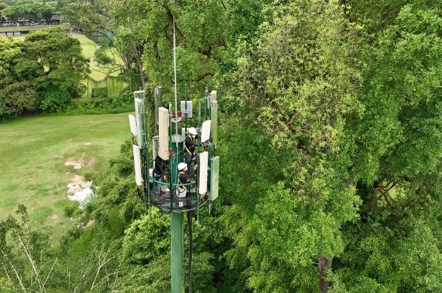 Singtel engineer installing 5G radio cell